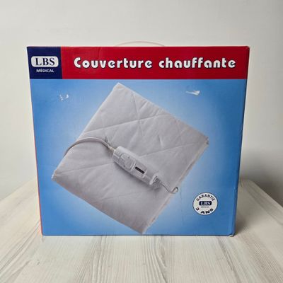 packaging of a box containing a heated blanket with a cord