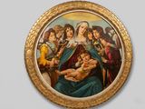 une image d'une peinture représentant une femme tenant un bébé sur ses genoux