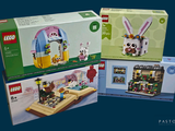 trois boîtes de Lego posées sur une table