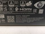 the back of a black power supply box sitting on a table