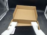 a box with a remote control inside of it
