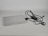 a laptop and a charger sitting on a table