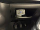 a close up of a control panel in a car