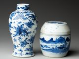 pair of chinese blue and white vases with landscape design