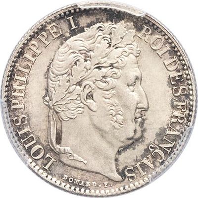 a close up of a coin on a white background