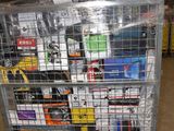 a metal cart with many items in it in a warehouse