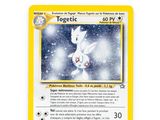 a close up of a pokemon card on a white surface
