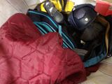 a pile of clothes and other items in a bag