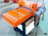 an orange machine that is sitting on a table