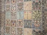 an image of a rug hanging on a wall in a room