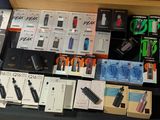 many different types of electronic devices on a table
