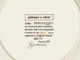 an image of a white plate with a picture of a woman on it