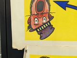 two pictures of a cartoon character on a refrigerator door