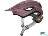 the helmet is pink and has a black vise on it