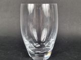a close up of a clear glass on a table