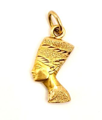 an image of a close up of a gold pendant on a white background
