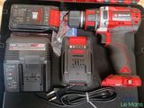 a cordless drill and two batteries in a case