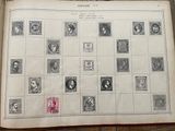 an old book with a lot of stamps on it