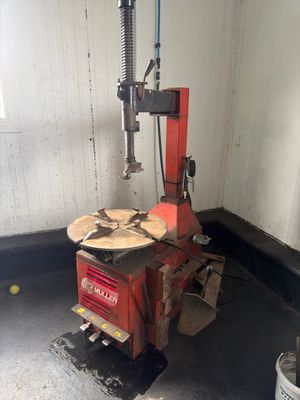 an image of a machine that is working on a piece of wood