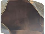 the inside of a louis vuitton bag with a zipper open