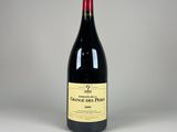 a close up of a bottle of wine on a table