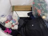 a lot of stuff in the bag on the floor