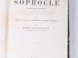 a book that is open on a white surface