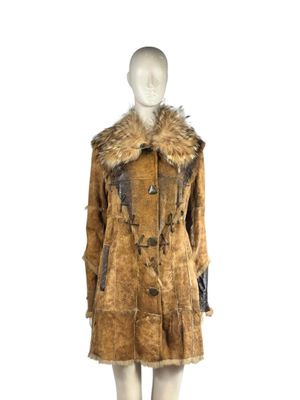 an image of a mannequin wearing a brown coat with a fur collar