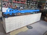 a large blue object on the counter in a store