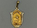 une image représentant une médaille d'or et d'argent sur laquelle figure une femme