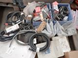 a pile of assorted electrical equipment on a table