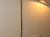 a lamp that is sitting on the floor in a room