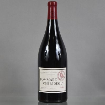 a bottle of wine that is sitting on a table