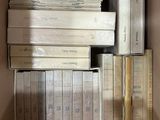a lot of books in a box on the floor