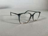 glasses on a table with a white surface and a white background