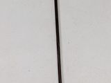 an image of a golf club and a ball on a table