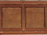 an old wooden window with two glass panes on top of it