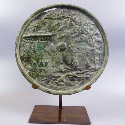 Arts d’Asie. Chine. Miroir illustrant la légende du voyage d…