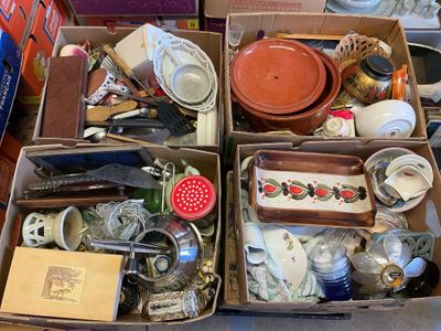 many boxes of assorted items sitting on a table