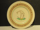 une assiette sur laquelle est représentée une girafe