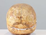 a ball with writing on it sitting on a table