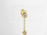 a pair of gold earrings with diamonds on a chain