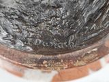 an image of a close up of a vase on a table