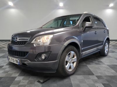 a picture of a dark colored suv parked in a room