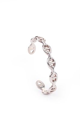 a close up of a silver ring on a white background