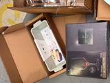 a box of wine glasses and a box of wine glasses on the floor