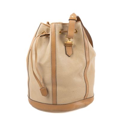 Christian DIOR Sac seau cuir grainé et cuir lisse en deux to…