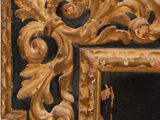 an image of a close up of a gold frame with a black background