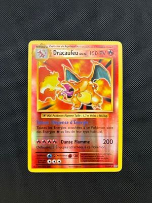a close up of a pokemon card on a table
