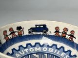an image of a blue and white bowl with a picture of people on it